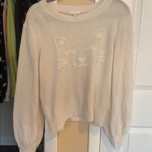 White cat sweater